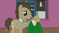 Dr. Hooves looks at his shirt S5E9