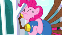 Pinkie happily playing the yovidaphone S8E18