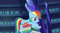 Rainbow Dash on a tall stack of books S7E25