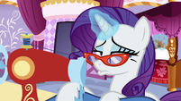 Rarity sewing at her boutique with a pout S9E19