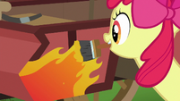 Apple Bloom paints flames on the cart S6E14
