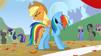 Applejack tying up Rainbow S1E13