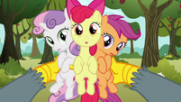 Gabby holding up the Cutie Mark Crusaders S6E19