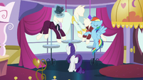 Rainbow explains why she's in Canterlot; Rarity continues adjusting hat S5E15