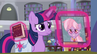 Twilight showing a picture of Dusty Pages S9E5