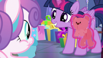 Twilight smiling at Flurry Heart while levitating a teddy bear S7E3