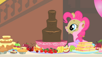 Pinkie Pie looks at the chocolate fountain S1E22