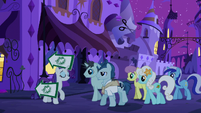 Rarity leading a crowd to The Tasty Treat S6E12