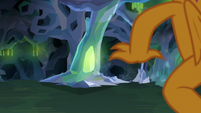 Tall changeling hive-like pillar S8E22