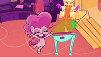 Pinkie next to her and her friends' cake PLS1E6b