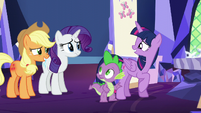 Twilight smiles at her friends embarrassed S5E16