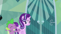 Spike pushes Starlight back toward the door S6E1