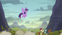 Twilight looking down at the fighting S5E23