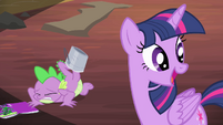 Twilight Sparkle is too happy and unaware to think about barrel rolls and Spike's demise.