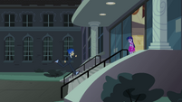 Flash Sentry runs up the school's front steps EG