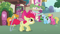 Apple Bloom about to throw the hoop, sticks and plates S2E06