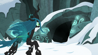 Queen Chrysalis flying toward the cave S9E8
