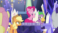 Pinkie Pie grinning; Applejack smirking S9E14