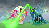 Chrysalis blasting her magic at Pinkie S9E25