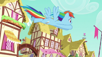 Rainbow Dash flying across Ponyville S6E9