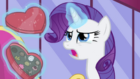 Rarity lifting a box of chocolates S4E23