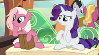 Rarity sits down next to Earth mare S9E26
