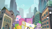 And poor Spike is carrying her things, again.