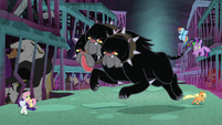 Cerberus pouncing around the cages S8E25