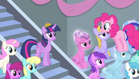 Pinkie Pie standing on Crystal Pony's head S4E24
