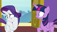 Rarity grinning nervously; Twilight surprised S9E19