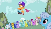 The ponies watching Scootaloo.
