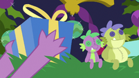 Spike picks up a Hearth's Warming gift S8E24