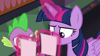 Twilight Sparkle looking at her notes S8E1