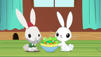 Angel sharing salad with bunny lawn gnome S6E11