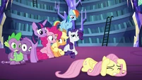 Fluttershy cowering; the others confused S5E21