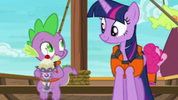 Spike smiling goofily at Twilight Sparkle S6E22