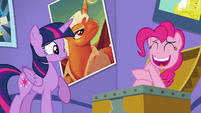 Twilight looks at Pinkie nervously laughing S5E19