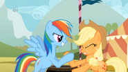 Rainbow Dash and Applejack in a hoof wrestling competition S01E13