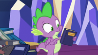 Spike looking at another book S8E24