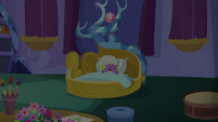 Spike sleeping in his castle bedroom S9E19