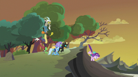 Starlight, Thorax, and Trixie walking toward the hive S6E26