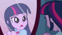 Twilight looking in a changing room mirror EG