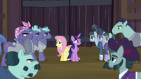 Twilight and Fluttershy surrounded by McColts S5E23