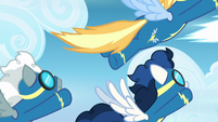 Wonderbolts fly across the screen S6E7