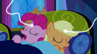 Applejack and Pinkie connected to magic threads S5E13