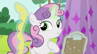 Sweetie Belle levitating a yellow fringe S6E14