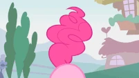 Pinkie with her tail up in the air.