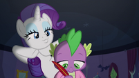 Rarity making a flirty face at Spike S9E19