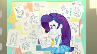 Rarity holding a sketch in her hands EGDS27