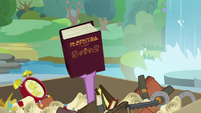 Spike holding up Twilight's book S9E5